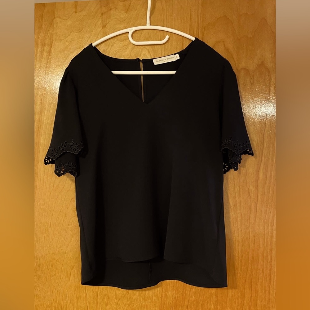 French black blouse by « la petite étoile » with cut-out details on sleeves